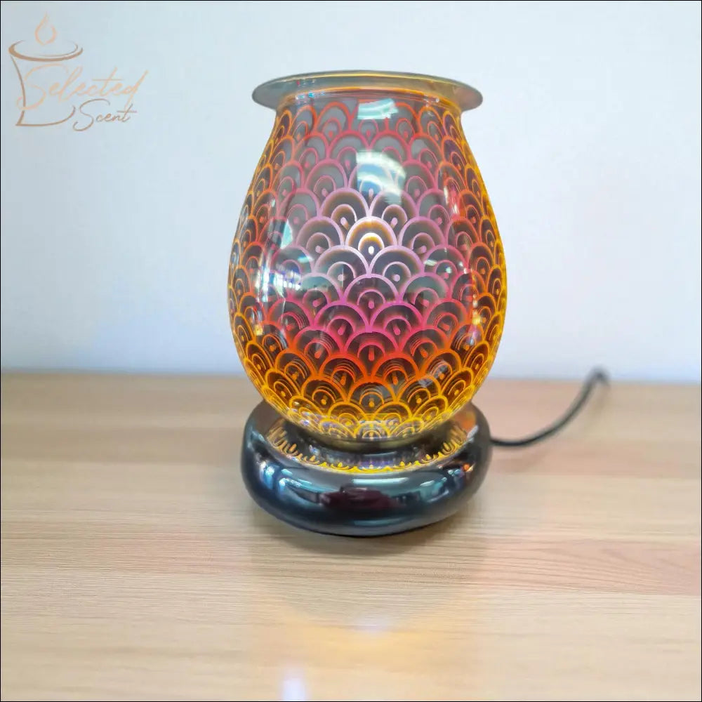 Selected Scent Electric Decorative Warmer with colorful patterned glass and black base on wooden surface