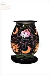Selected Scent Electric Decorative Warmer with sun and moon design and intricate light patterns