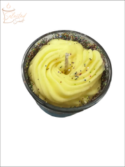 Make Your Wish scented candle by Selected Scent with yellow swirl wax and colorful glitter accents