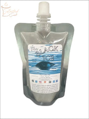 Selected Scent black ice squeezable wax melt in a silver pouch with a white spout cap