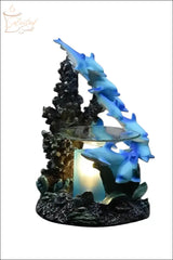Selected Scent family dolphin aromatherapy burner featuring blue dolphins swimming around coral with candle holder