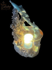 Selected Scent family dolphin aromatherapy burner with glowing tealight and detailed dolphin design