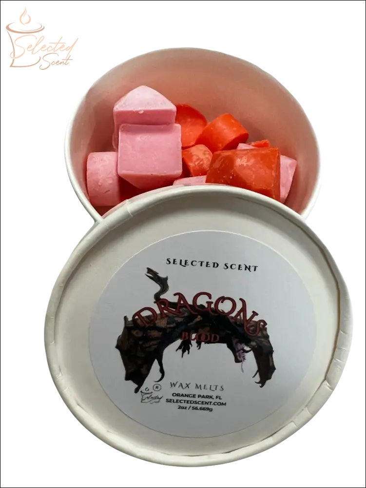 Selected Scent container of dragons blood wax melts with pink and red wax pieces for home fragrance