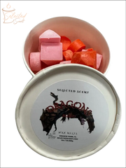 Selected Scent container of dragons blood wax melts with pink and red wax pieces for home fragrance