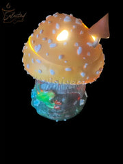 Selected Scent frog and mushroom wax warmer with glowing yellow mushroom cap and small green frog detail
