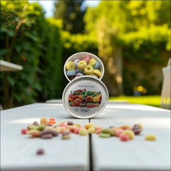 Selected Scent Fruit Loop cereal scented wax melts in a round tin with colorful wax pieces outdoors