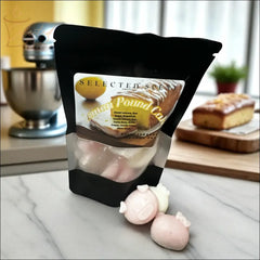 Selected Scent Lemon Pound Cake scented wax melts with cute design in resealable black pouch on marble countertop