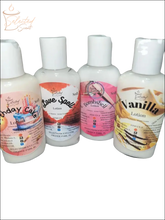 Selected Scent vitamin e moisturizing lotion bottles in birthday cake love spell bombshell and vanilla scents