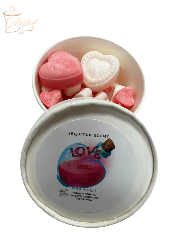 Selected Scent white round tin with pink and white heart shaped and mini hearts love spell wax melts