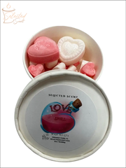 Selected Scent white round tin with pink and white heart shaped and mini hearts love spell wax melts
