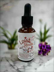 Selected Scent Love Spells body oil bottle for hydrating and protecting skin with natural ingredients