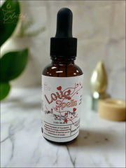 Selected Scent Love Spells body oil bottle for hydrating and protecting skin with a dropper cap
