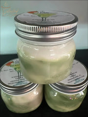 Selected Scent scented candles in small jars labeled with Zero Calories And Guitless fragrance