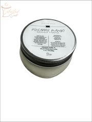 Selected Scent votive candle with mango butter in a small glass jar with metal lid