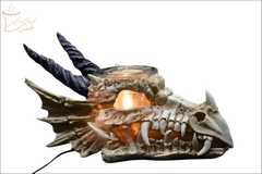 Selected Scent Electric Decorative Warmer shaped like a dragon skull with lit candle inside