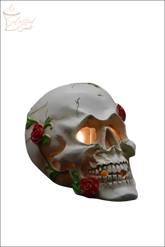 Selected Scent electric decorative warmer shaped like a skull with red roses and glowing light inside