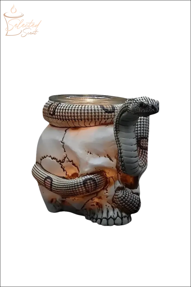 Selected Scent Electric Decorative Warmer shaped like a cracked skull wrapped with a realistic cobra snake