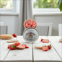 Selected Scent strawberry shortcake wax melts for fragrance in a white container with fresh strawberries on a wooden table