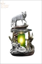 Selected Scent Electric Decorative Warmer featuring white wolf family design with glowing green light