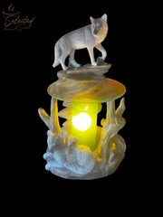 Selected Scent electric decorative warmer featuring wolf and deer design with glowing light