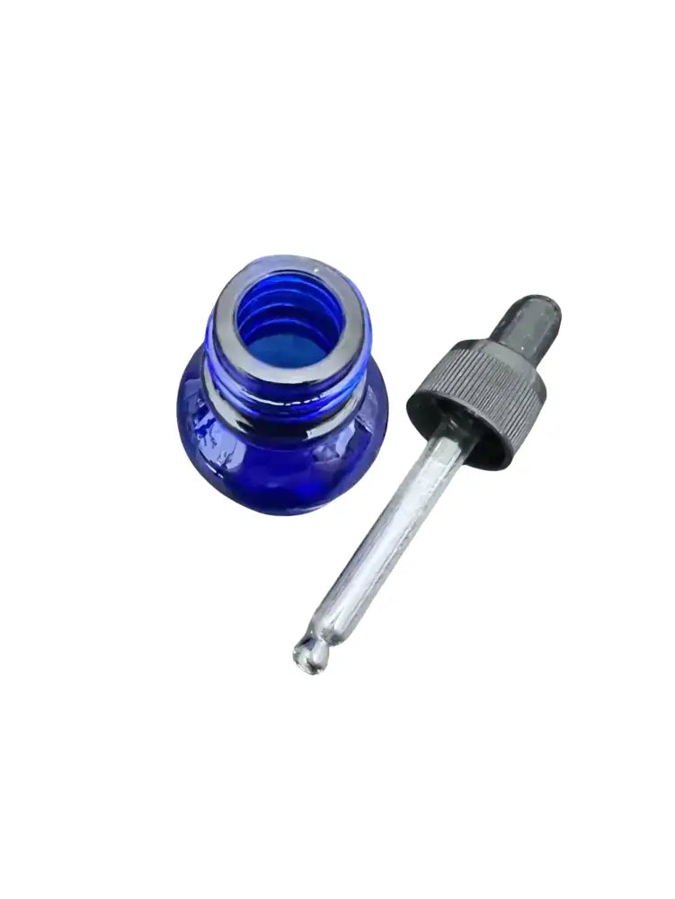 Blue glass bottle with dropper for pure fragrance oils for diffusers by Selected Scent