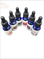 Selected Scent blue bottles with black droppers containing pure fragrance oils for diffusers in various scents