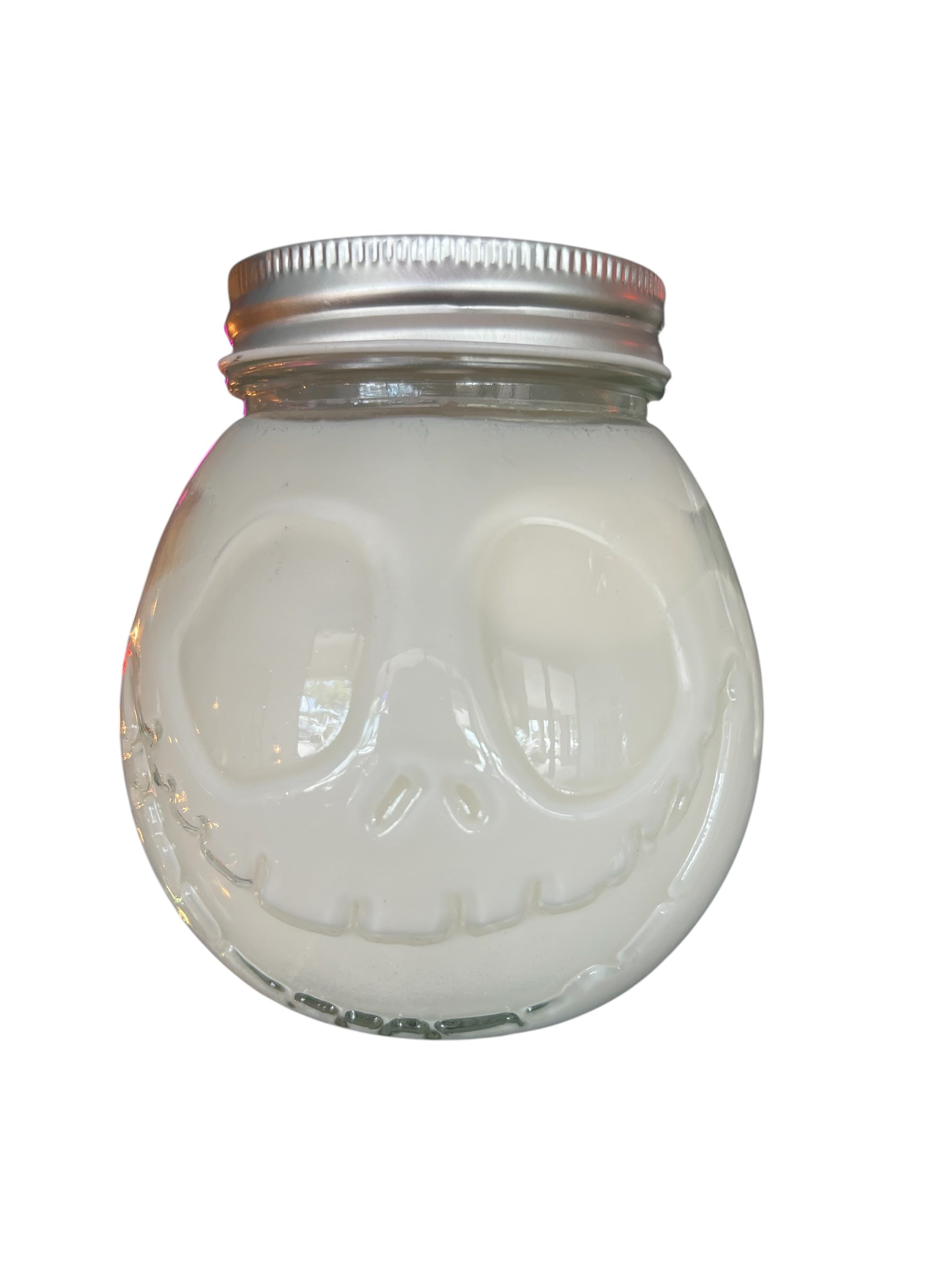 Selected Scent 16 oz pumpkin spice candle cup in skull-shaped glass jar with metal lid