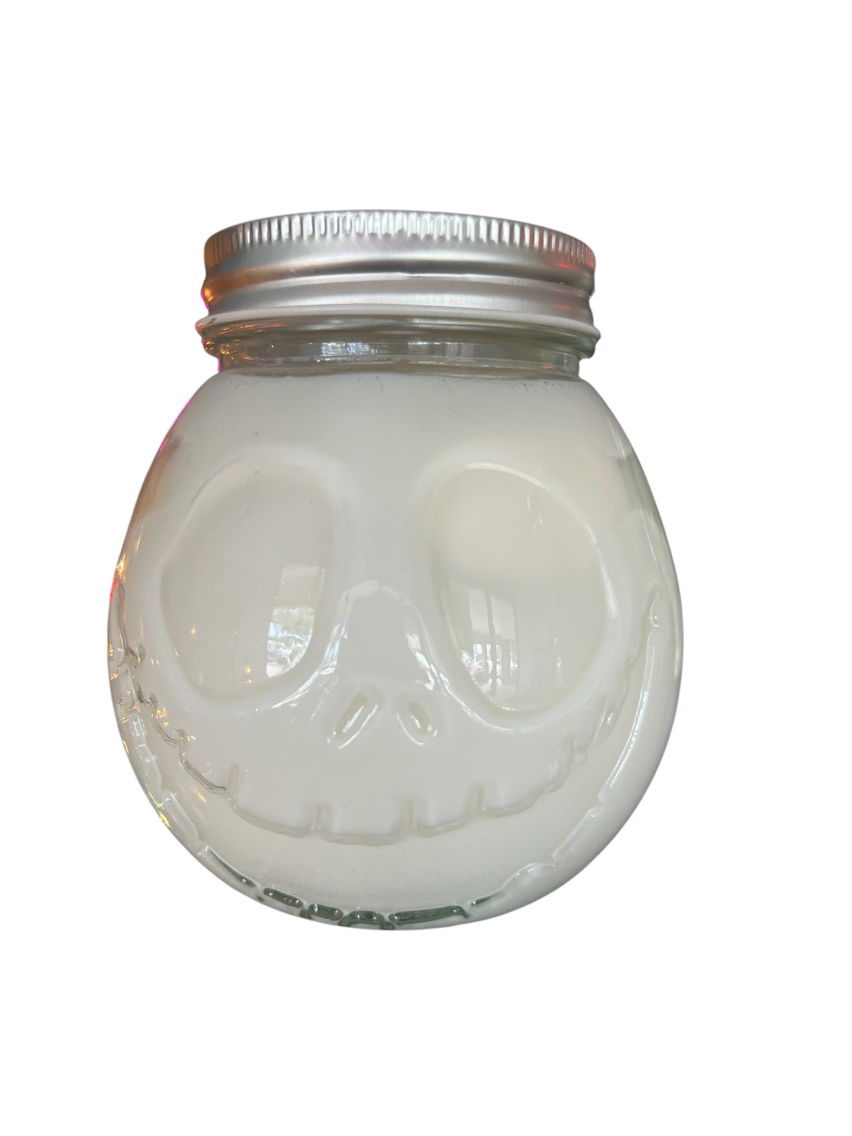 Selected Scent 16 oz pumpkin spice candle cup in skull-shaped glass jar with metal lid