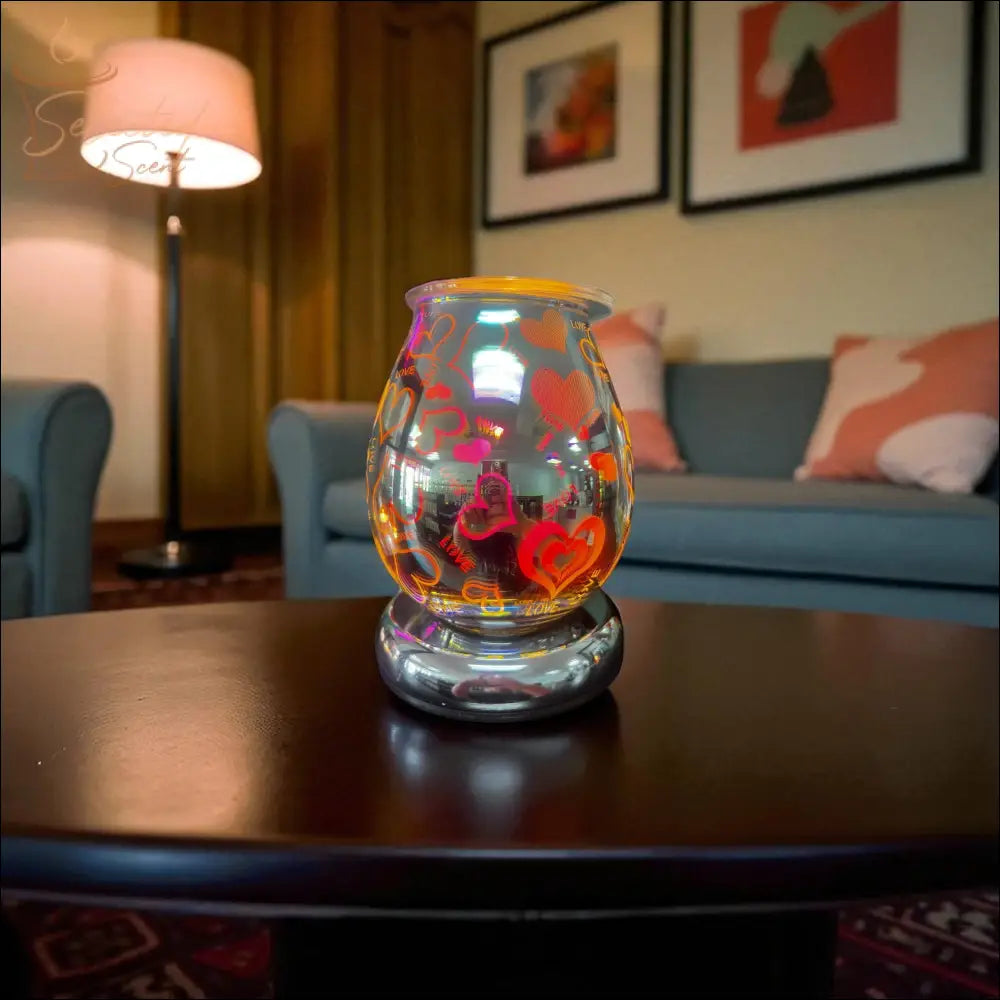 Selected Scent Electric Decorative Warmer with colorful heart designs on a living room table