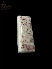Selected Scent all natural wax melts in white with red speckles segmented for easy use