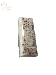 Selected Scent all natural wax melts bar with white base and red speckles for home fragrance
