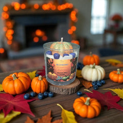 All natural fall scented candle by Selected Scent with blueberry pumpkin patch scent surrounded by mini pumpkins and autumn leaves