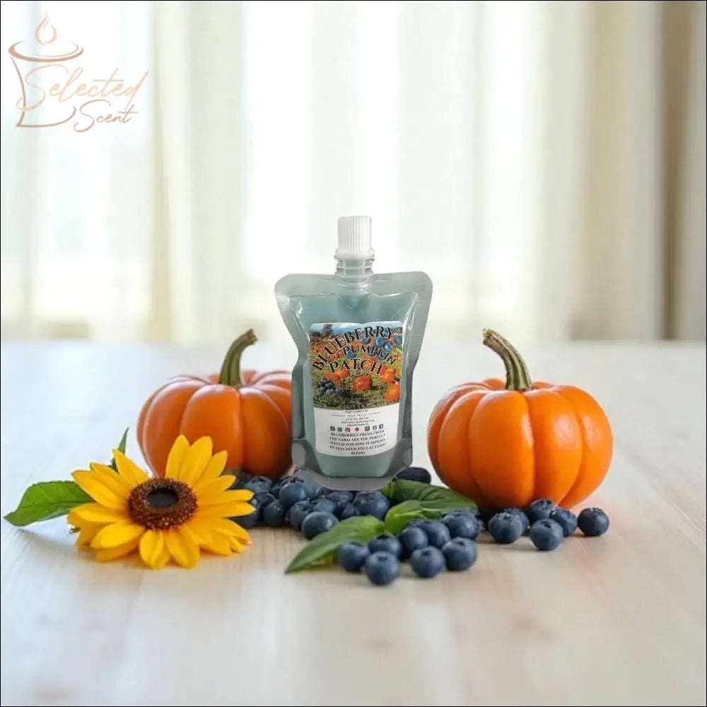 Selected Scent fall seasonal favorites pouch with pumpkins, blueberries, and sunflower on wooden table