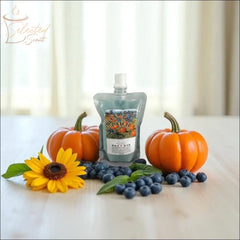 Selected Scent fall seasonal favorites pouch with pumpkins, blueberries, and sunflower on wooden table
