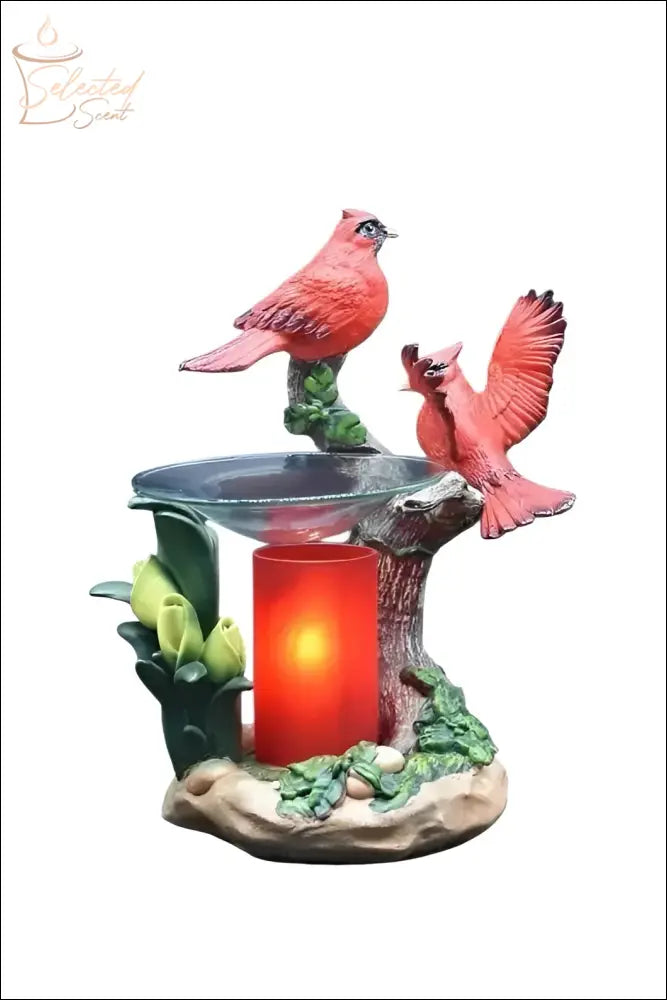 Selected Scent cardinals oil warmer with two red cardinal birds and glowing candle holder