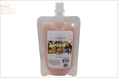 Selected Scent Champagne Toast squeezable wax melts for home in a soft pink pouch with twist cap