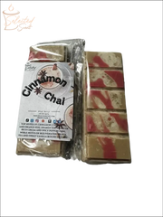 Selected Scent cinnamon chai scented home decor wax melts with red and beige swirls in clear packaging