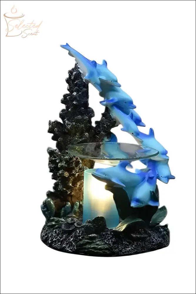 Selected Scent family dolphin aromatherapy burner featuring blue dolphins swimming around coral with candle holder