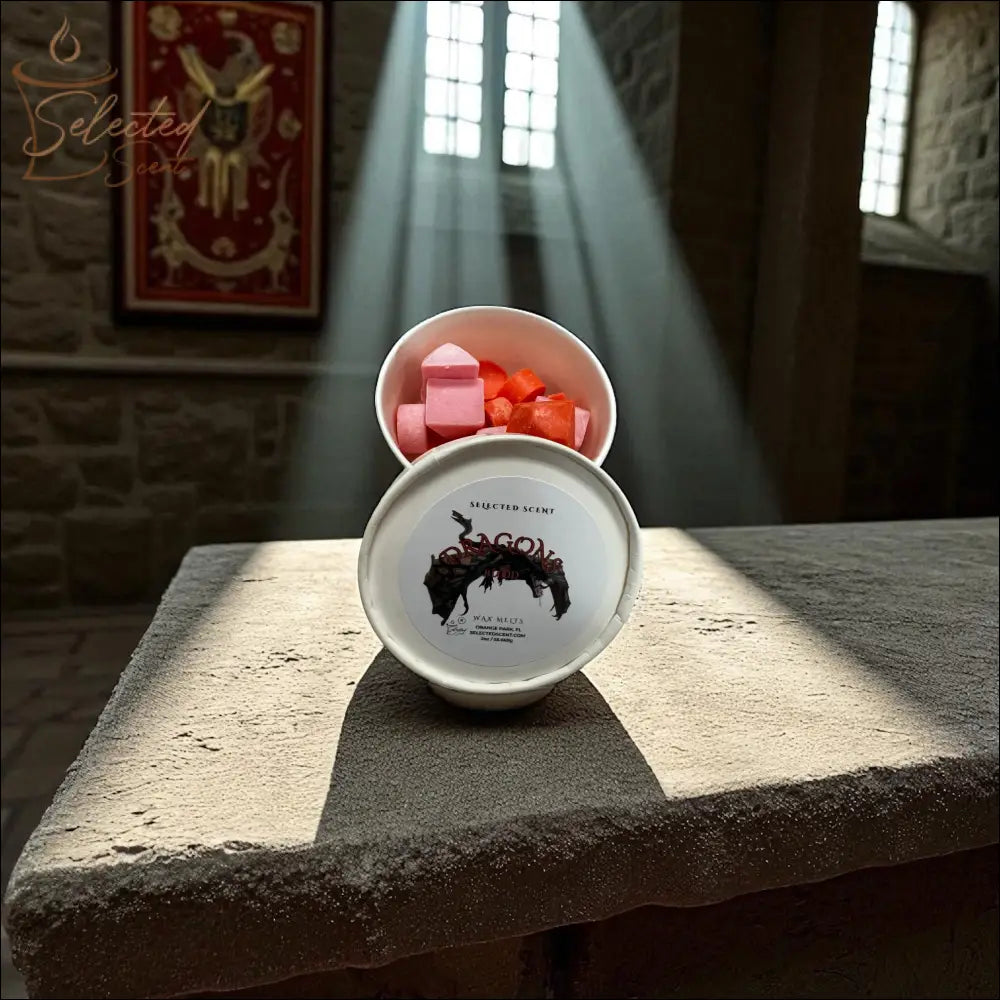 Selected Scent jar of dragons blood wax melts red cubes in white tin on stone table with sunbeams