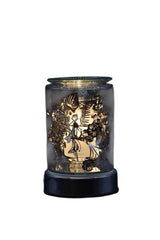 Selected Scent electric decorative warmer with intricate leaf patterns and warm glowing light