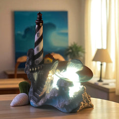 Selected Scent Electric Decorative Warmer shaped like lighthouse with glowing light and seashell accents