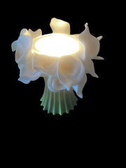 Selected Scent Electric Decorative Warmer with glowing white floral design and green base