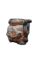 Selected Scent Electric Decorative Warmer shaped like a cracked skull wrapped with a realistic cobra snake
