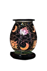 Selected Scent Electric Decorative Warmer with sun and moon design and intricate light patterns