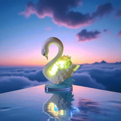 Selected Scent electric decorative warmer shaped like a glowing swan on reflective surface at sunset
