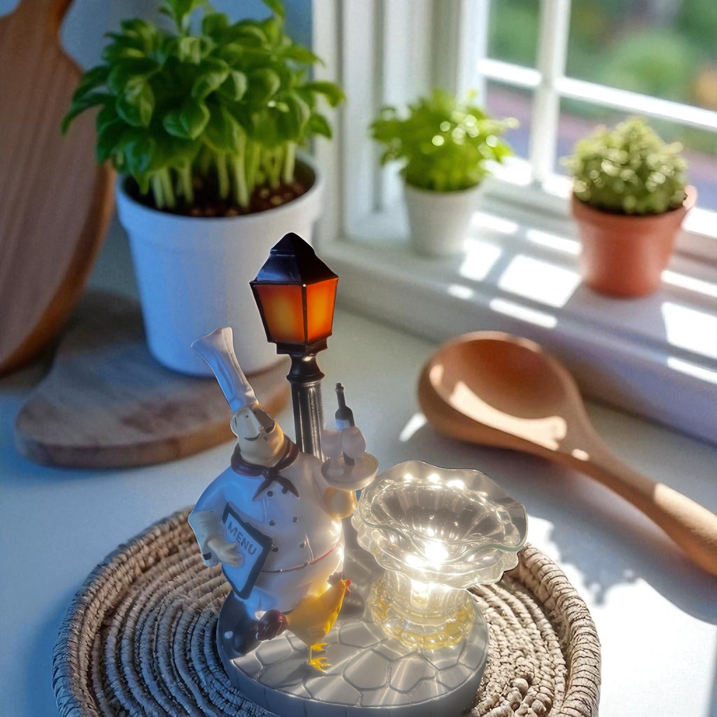 Selected Scent Electric Decorative Warmer featuring a chef and street lamp design on a woven placemat