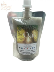 Selected Scent Enchanted Oak squeezable wax melt with earthy amber musk and vanilla notes
