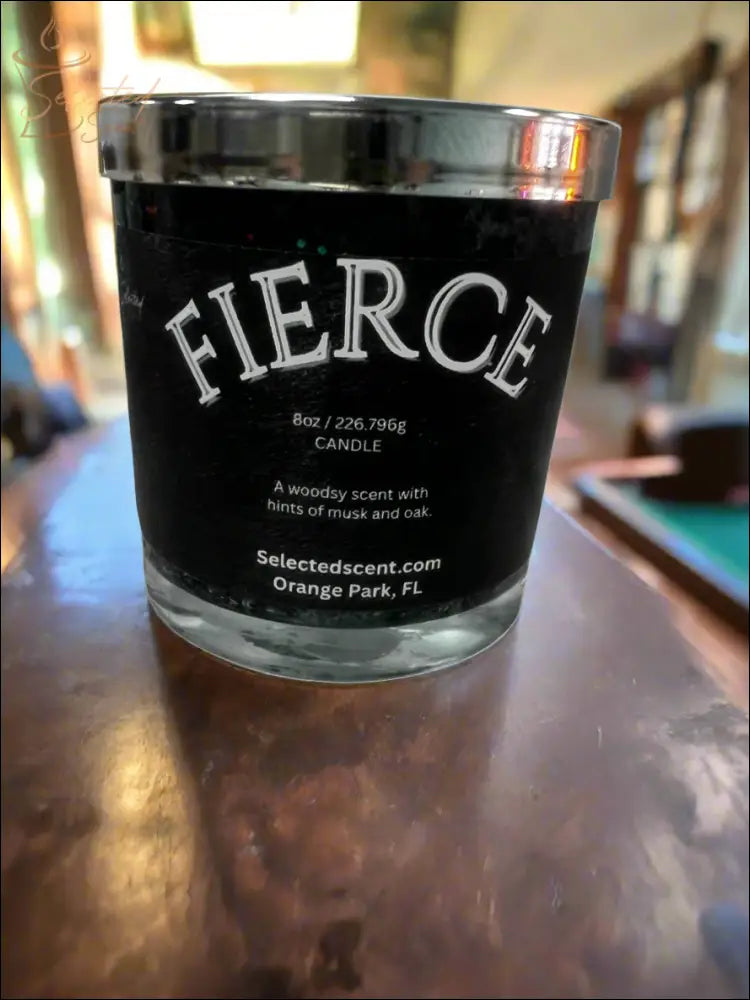 Selected Scent Fierce candle with Reflecting Flame Crystalized Design in black glass jar with silver lid