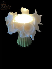 Selected Scent Electric Decorative Warmer with glowing white floral design and green base