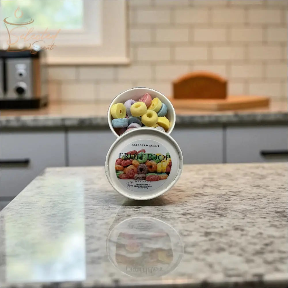 Selected Scent cereal scented wax melts in a white round container on kitchen countertop